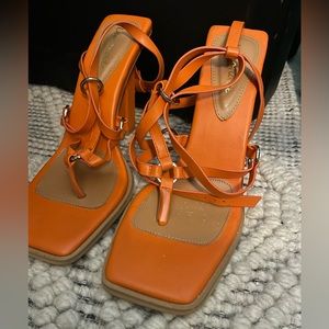 Orange heels . Size 9